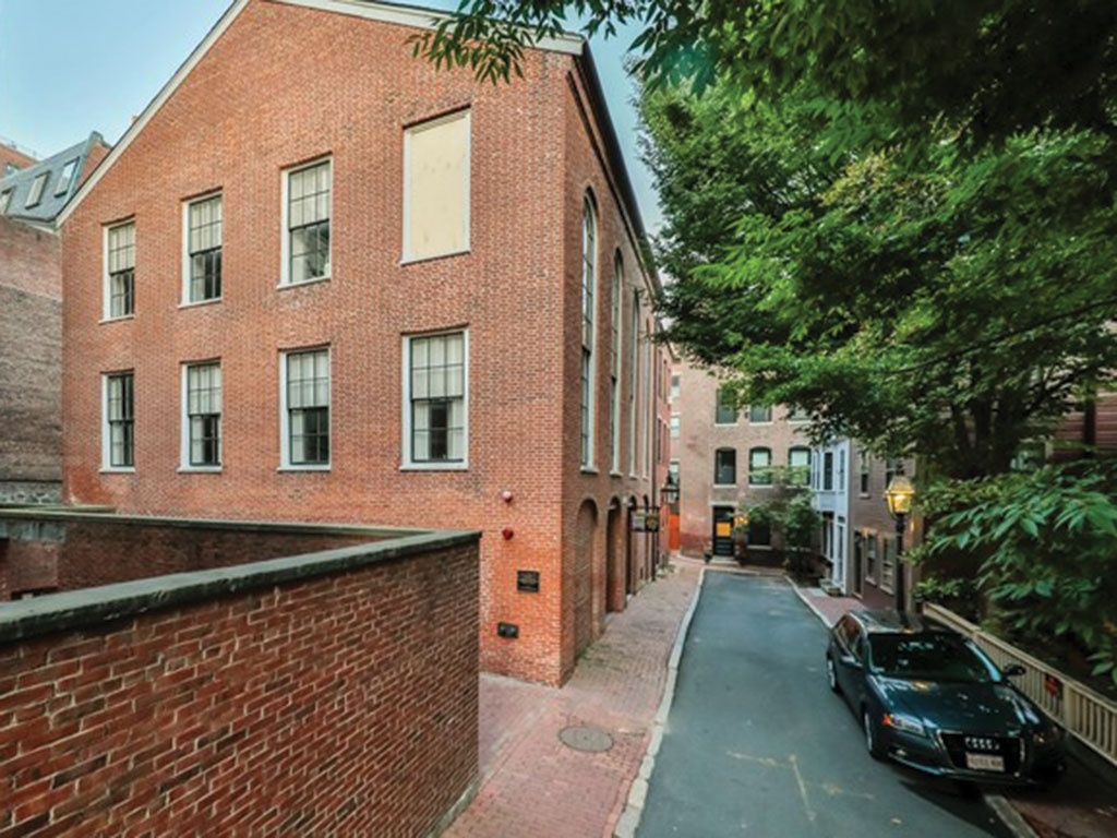 walkway alongside the red bricked african meeting house in boston