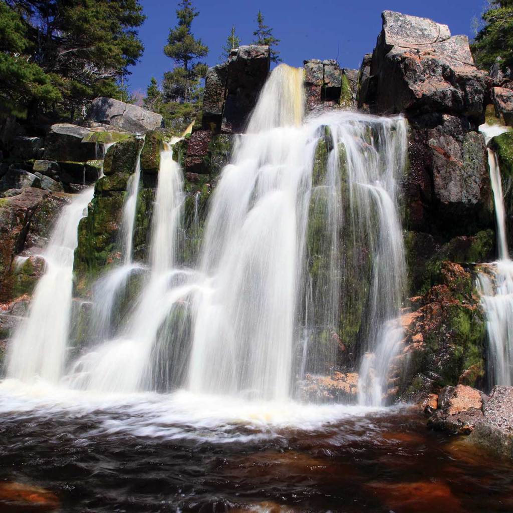 sprays of water rushing down a waterfall in Cape Breton
