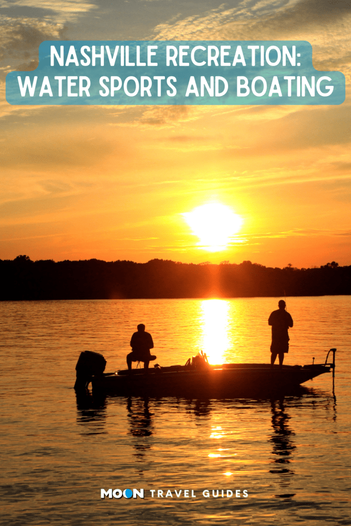 pin graphic with sunset fishermen